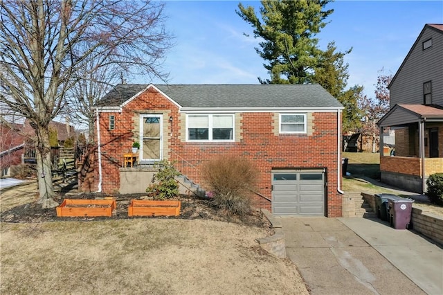 bungalow with a garage, concrete driveway, brick siding, and roof with shingles