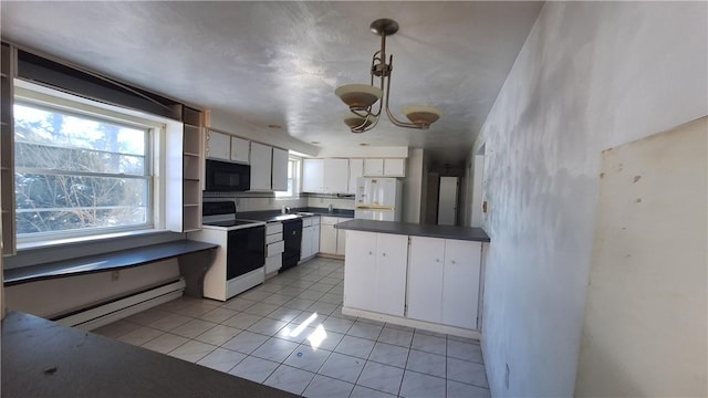 kitchen with decorative light fixtures, dark countertops, baseboard heating, white cabinets, and black appliances