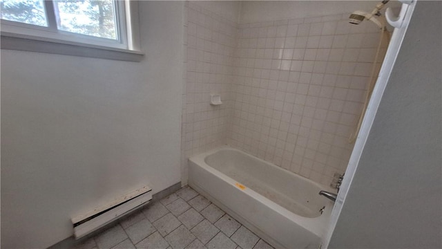 bathroom with shower / bath combination, a baseboard radiator, and tile patterned floors