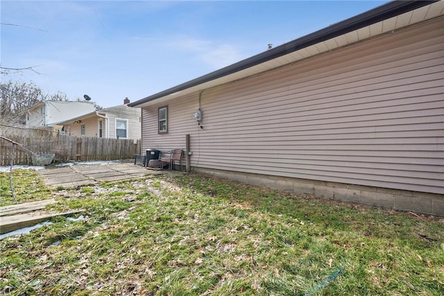 view of property exterior with fence