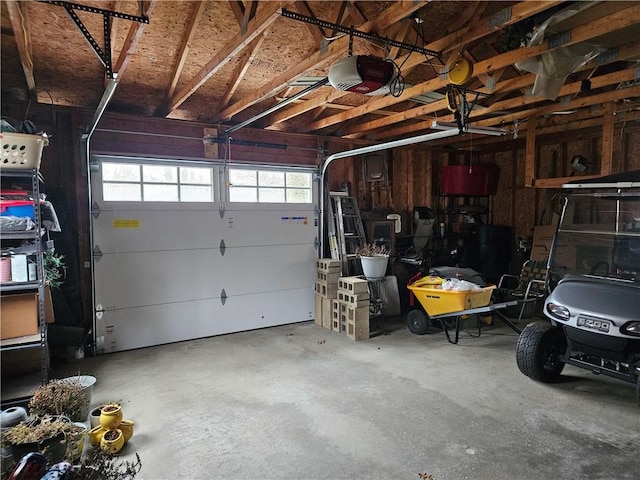 garage featuring a garage door opener