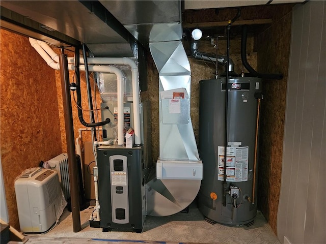 utility room with gas water heater