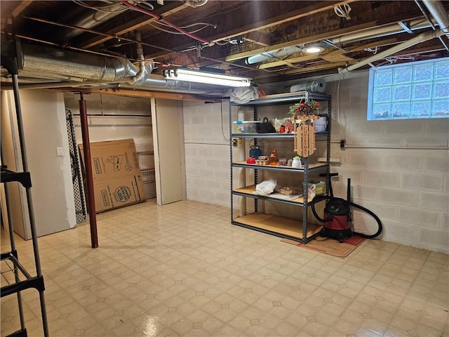 basement with tile patterned floors