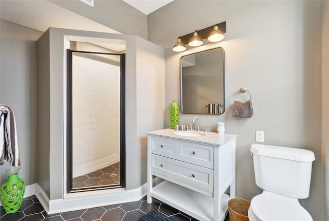 full bathroom with baseboards, toilet, a shower stall, and vanity