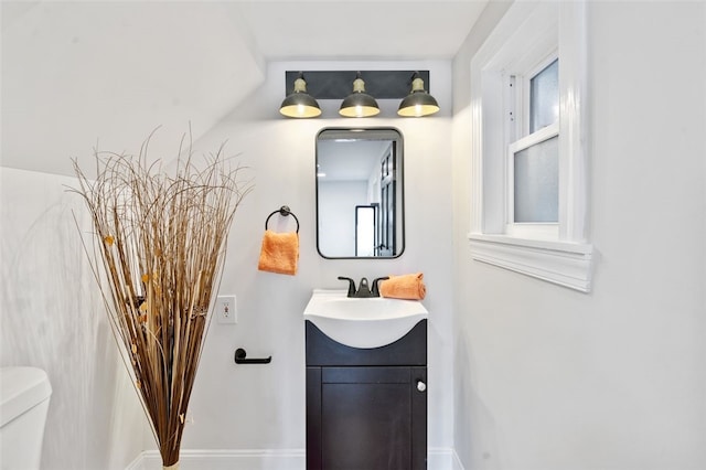 half bath with toilet and vanity