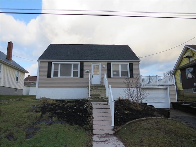 view of front of property with driveway and an attached garage