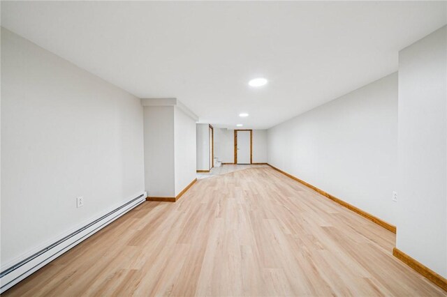 2972 Benshoff Hill Rd, Pa, PA 15909 - unfurnished room featuring baseboards, light wood-style flooring, recessed lighting, and baseboard heating