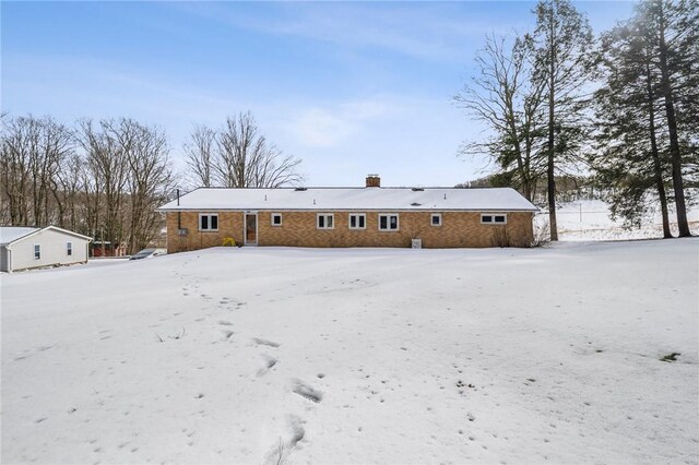 2972 Benshoff Hill Rd, Pa, PA 15909 - snow covered house with a chimney