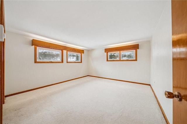 2972 Benshoff Hill Rd, Pa, PA 15909 - empty room with baseboards, a wealth of natural light, and carpet