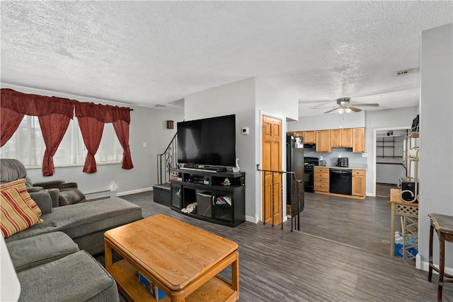 living room featuring baseboards, stairs, a baseboard heating unit, and dark wood finished floors