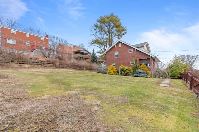 view of yard featuring fence