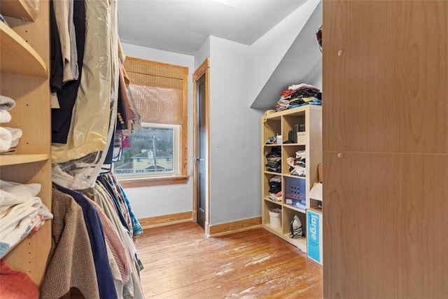 walk in closet featuring light wood-style floors