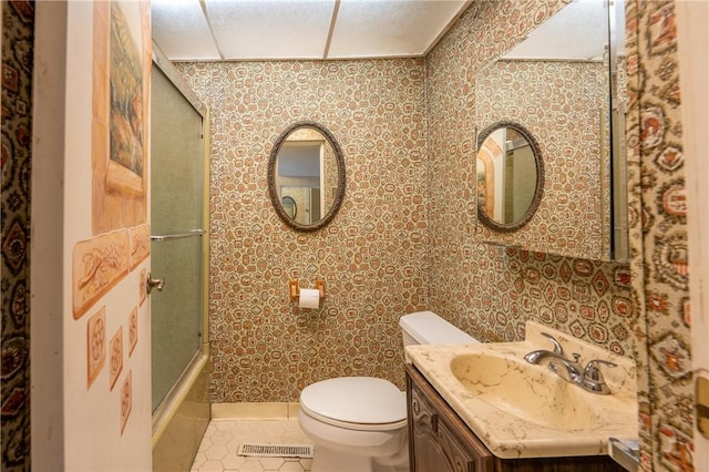 full bath with visible vents, tile patterned flooring, vanity, and toilet