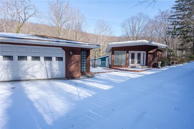 exterior space featuring a garage