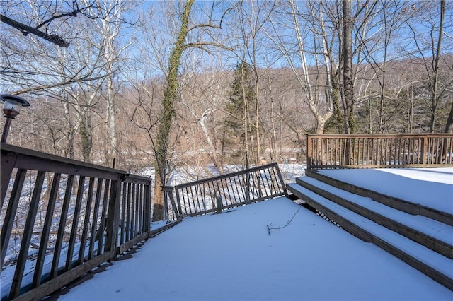 view of snow covered deck