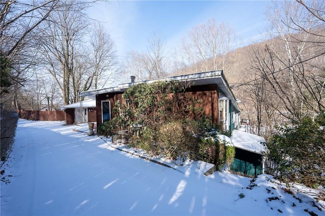 view of snow covered property