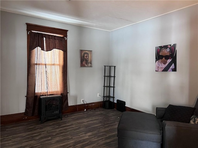 living area with dark wood finished floors and baseboards