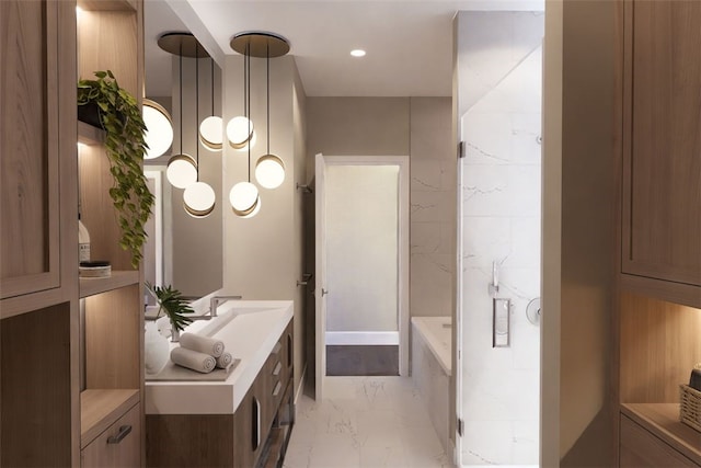 full bath with a washtub, recessed lighting, marble finish floor, and vanity