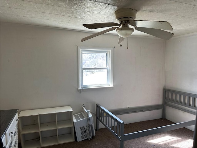 unfurnished bedroom with carpet and ceiling fan