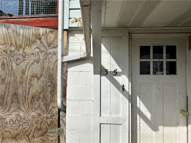 exterior details featuring concrete block siding