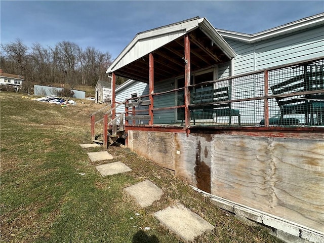 view of property exterior featuring an outbuilding