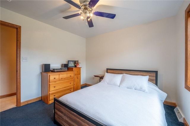 bedroom featuring ceiling fan, dark colored carpet, visible vents, and baseboards