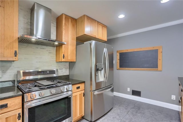 kitchen featuring dark countertops, wall chimney exhaust hood, tasteful backsplash, and stainless steel appliances