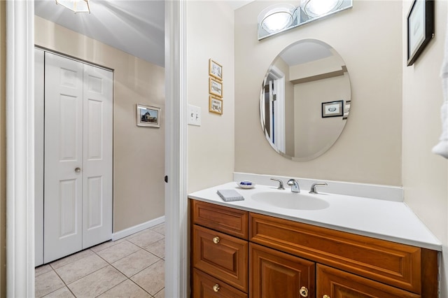 bathroom featuring tile patterned floors and vanity