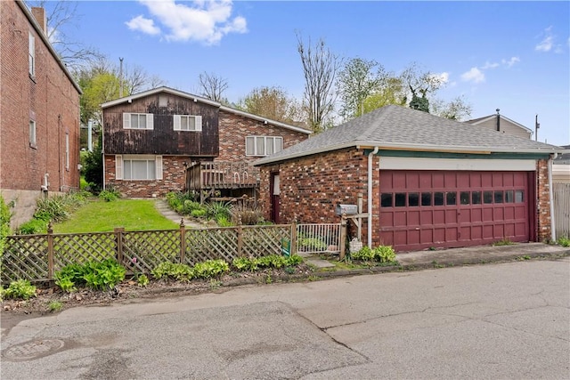 4727 Penn Way, Versailles Boro, PA 15132 - tri-level home featuring brick siding, roof with shingles, and fence private yard