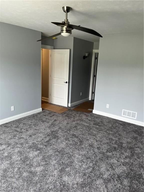 115 White Fox Ct Unit 33, North Sewickley Twp, PA 16117 - empty room featuring carpet floors, a ceiling fan, and baseboards