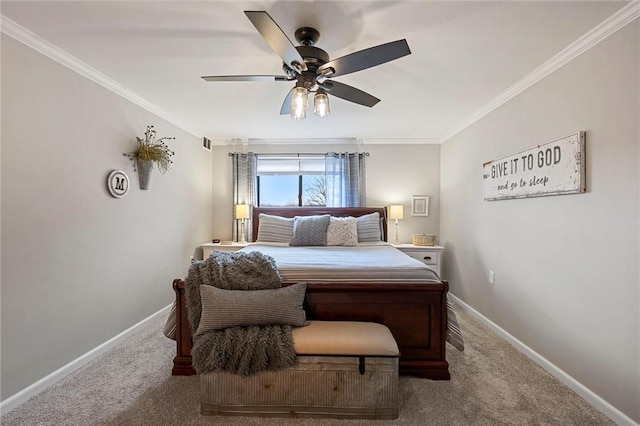 carpeted bedroom featuring crown molding, ceiling fan, and baseboards