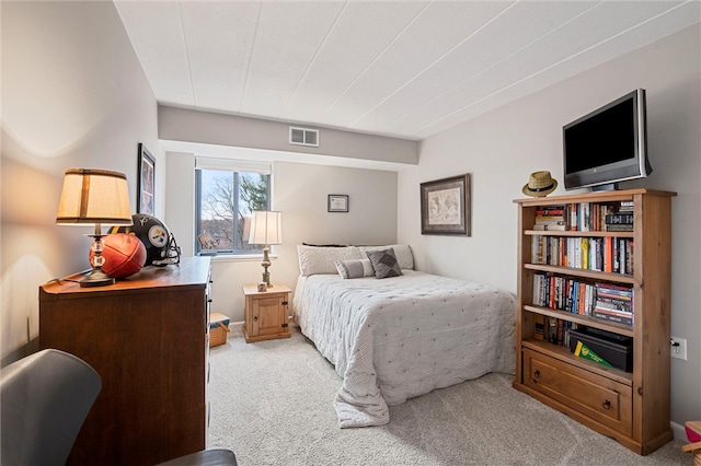 bedroom with light carpet, baseboards, and visible vents