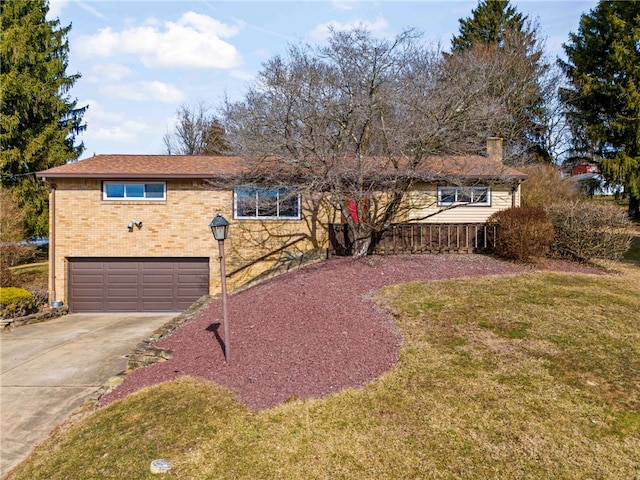 ranch-style home featuring an attached garage, brick siding, driveway, a chimney, and a front yard