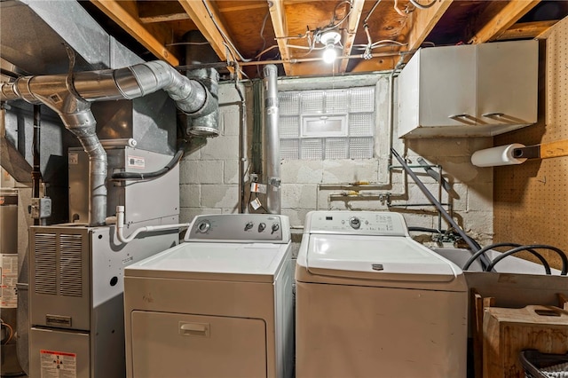 laundry area with laundry area and separate washer and dryer