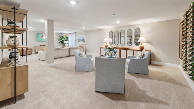 living room with light carpet, baseboards, and recessed lighting