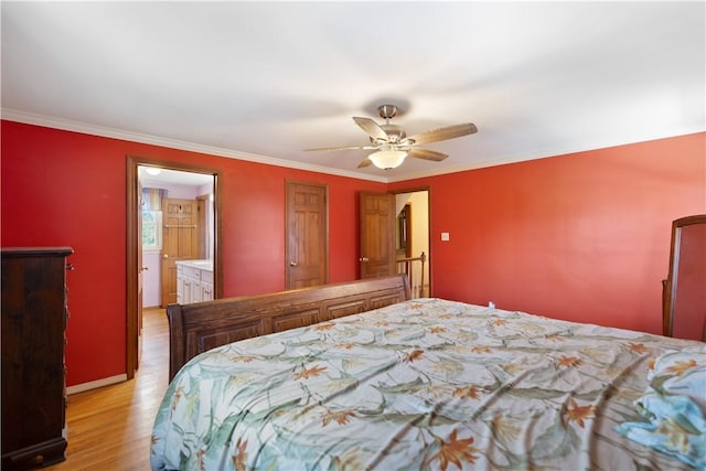 bedroom with light wood-style floors, a ceiling fan, baseboards, and crown molding