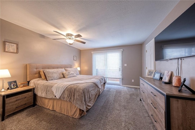 bedroom with a textured ceiling, carpet flooring, a ceiling fan, and baseboards