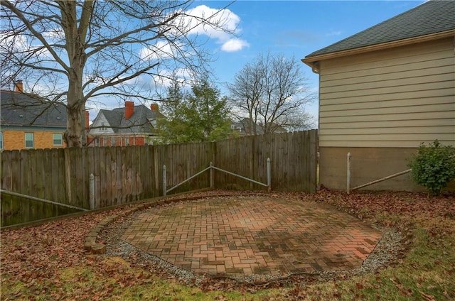 view of yard featuring a fenced backyard and a patio