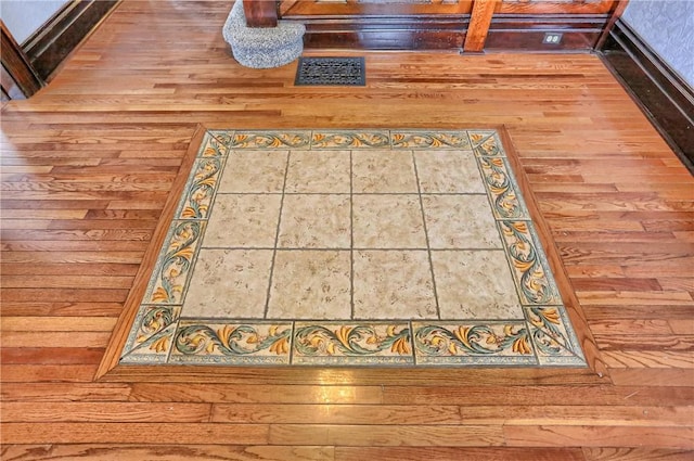 details featuring wood finished floors and visible vents