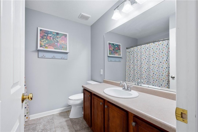 full bathroom featuring tile patterned flooring, toilet, vanity, visible vents, and baseboards