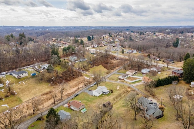 birds eye view of property with a residential view