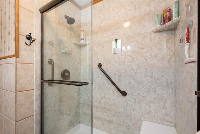 bathroom featuring a stall shower