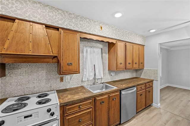 kitchen featuring stainless steel dishwasher, brown cabinetry, dark countertops, and white electric range oven