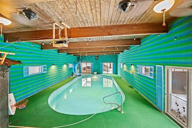 indoor pool with a jacuzzi