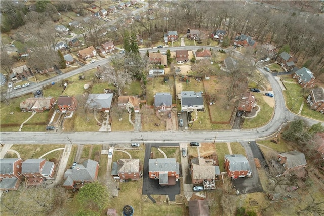 birds eye view of property with a residential view