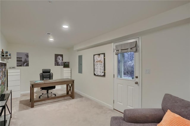 office with recessed lighting, electric panel, light carpet, and baseboards