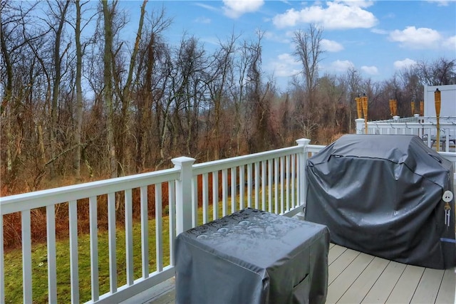 wooden terrace with grilling area