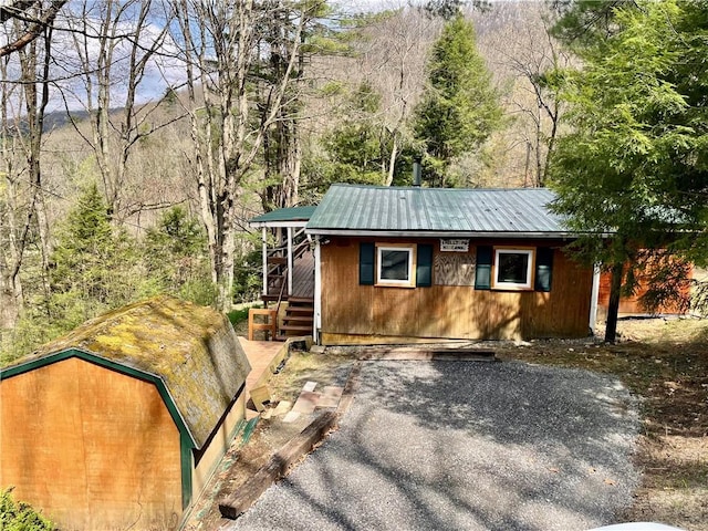 1958 Church Hill Rd, North-Other Area, PA 16351 - view of side of home featuring metal roof
