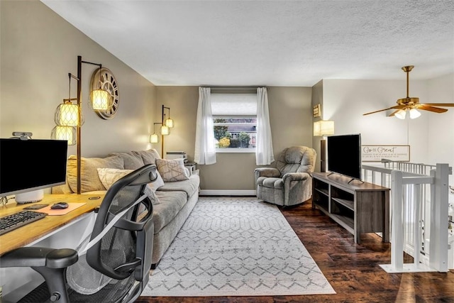 living room with ceiling fan, a textured ceiling, baseboards, and dark wood-style flooring