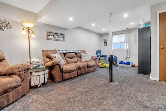 carpeted living area with recessed lighting